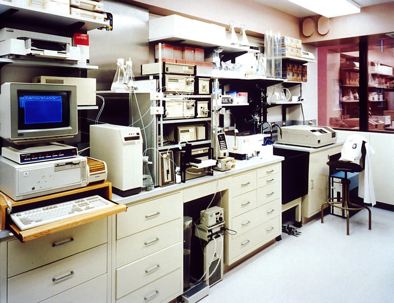 Medical laboratory testing equipment with graphs and charts